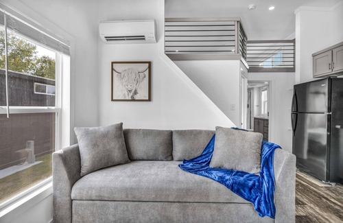 Brenham Cottage | Cottage with Loft - Pet Friendly - Includes 3 queen beds (one in master and 2 in loft), a fully equipped kitchen, dining area, private bath and shower, TVs, Wifi, all utilities, access to all resort amenities. This cottage is pet friendly.