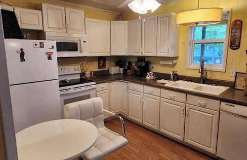 Pipestem Cabin | Cottage with private hot tub- the perfect way to relax after a day of exploring