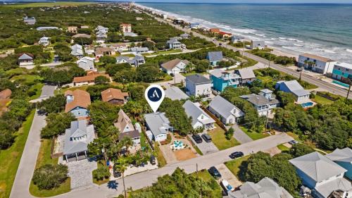 Vilano Beach House | Cottagecore Coast Deck Hot Tub Surf-Centric Neighborhood Kids Suite