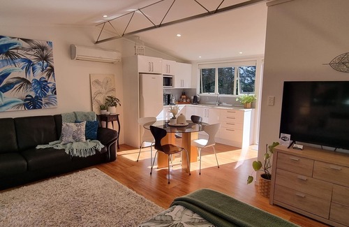 Pyes Pa Apartment | Country Bliss couples oasis, outdoor chiminea in private garden, & sunset deck.
