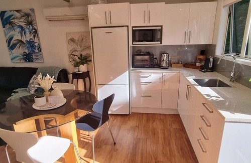 Pyes Pa Apartment | Country Bliss couples oasis, outdoor chiminea in private garden, & sunset deck.