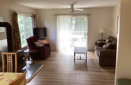 Eagle Bay House | Country Cottage with enclosed yard. Quiet wooded location.