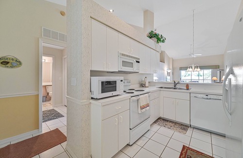 Estero Condo | Country Creek - Charming and Light Corner Condo with Golf !