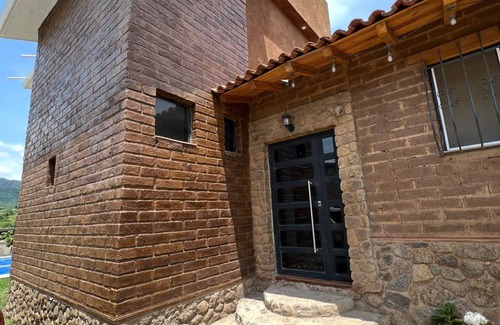 San Guillermo House | Country house with pool surrounded by beautiful mountains