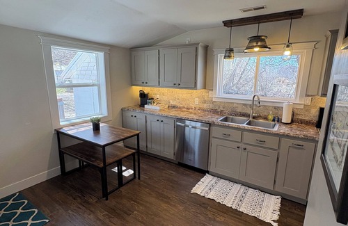 St. Anthony House | Country living house 5 min to sand dunes with large patio, hot tub, and fire pit