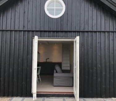 Roskilde Municipality Apartment | Country-living with a lovely view and own terrace, entrance and parking