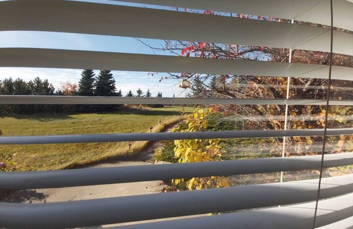 Bearspaw House | Countryside Escape: nPrivate Suite with Scenic Views