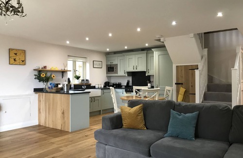 Graigfechan House | Countryside Home with jacuzzi hot tub, open plan living and wood burner.