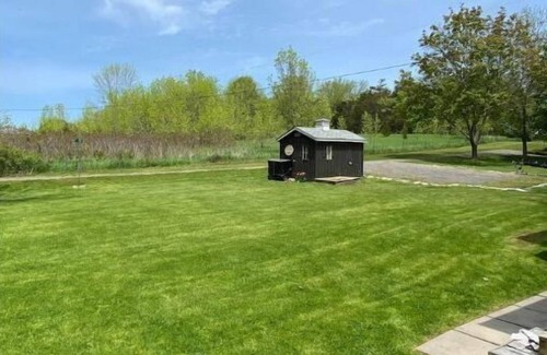 Milford Cottage | County Beach House - right on South Bay with incredible Lake Ontario views