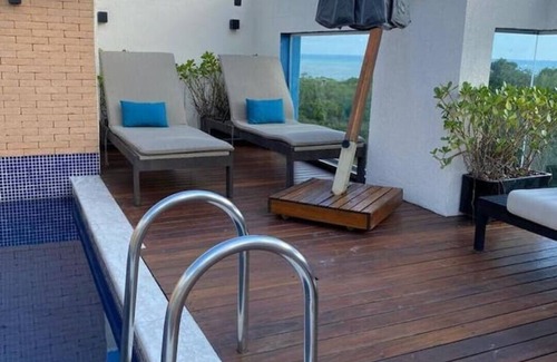 Tombo Apartment | Cover! Heated pool and beach service.