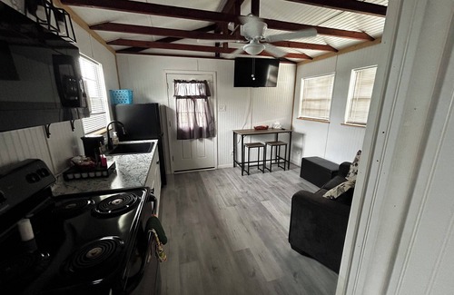 Richland Springs Cabin | Coyote Country White Cabin 1BR/1BA on a tall hill