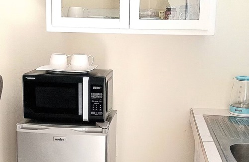 Arima Apartment | Cozy 1-bedroom apartment with WiFi, AC and mins to Airport