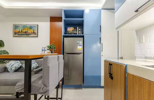 South Triangle Condo | Cozy 1-Bedroom Condo in Quezon City - Free Pool Access