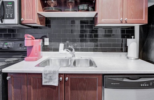 Kitchener Condo | Cozy 1-bedroom condo in downtown Kitchener with WiFi, AC. in-room movie theather