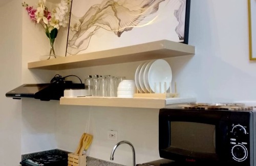 Las Pinas Condo | Cozy 1-bedroom condo with Golden Hour balcony view and WiFi