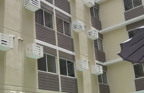 Silang Condo | Cozy 1-bedroom condo with AC, WiFi in serene Silang Kitchen mini karaoke.