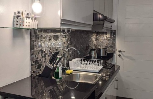 Pasig Condo | Cozy 1-Bedroom Hideaway: Your Home Away from Home - near malls & restaurants!