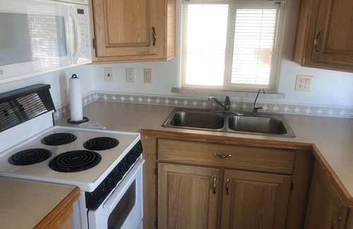 Foothills House | Cozy 1-bedroom mobile home in Yuma Foothills. Additional screened Arizona Room