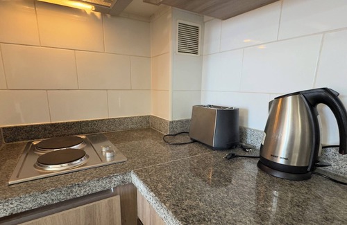 Historical District Apartment | Cozy 1-bedroom with WiFi, fitness room in welcoming Antofagasta