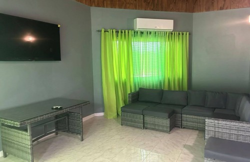 Crane corner Villa | Cozy 2-bedroom 2.5 bathroom villa in Black River with beach in the backyard