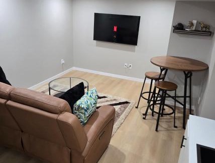 Pinehouse Apartment | Cozy 2 bedroom basement with side entrance