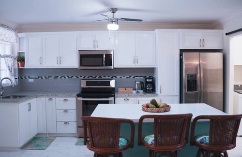 Green Garden House | Cozy 2-bedroom townhome in enchanting Atlantic Shores with Wi-Fi, AC, and more.