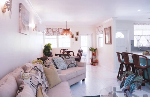 Green Garden House | Cozy 2-bedroom townhome in enchanting Atlantic Shores with Wi-Fi, AC, and more.