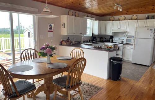 Saint Peters Bay Cottage | Cozy 2-bedroom cottage overlooking Saint Peters Bay AC, WiFi & gorgeous sunsets