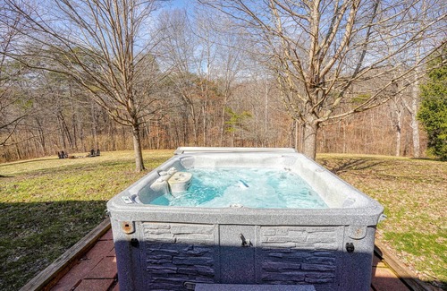 Creola Cabin | Cozy 2-bedroom cabin. Private and wooded setting, WiFi, Pond & Hot Tub