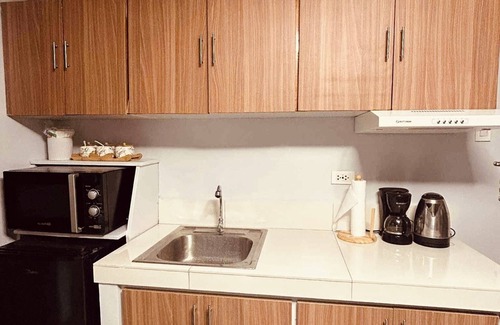 Mandurriao Condo | Cozy 2-bedroom condo with AC, fitness room in lovely Iloilo City