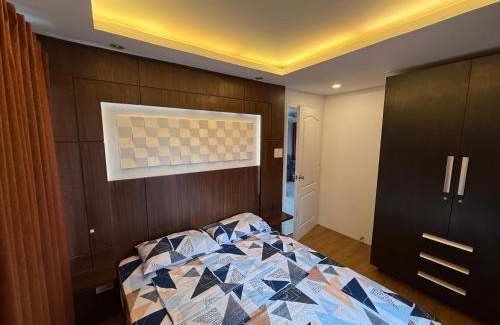 Santolan Apartment | Cozy 2-bedroom Condo at Marcos Highway