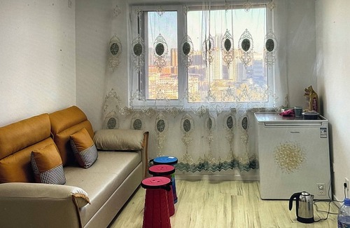 Yantai Condo | Cozy 2-bedroom condo in lovely Yan Tai with AC, WiFi