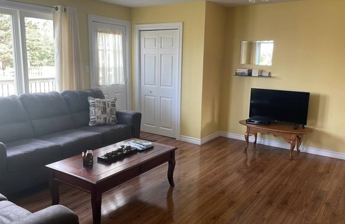 Cow Head House | Cozy 2 bedroom located in Gros Morne, Shallow Bay Beach. Admiring sunsets