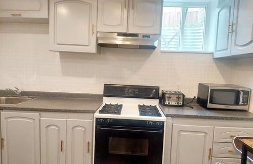 Ajax Apartment | Cozy 2 bedroom plus Den walkout basement apartment