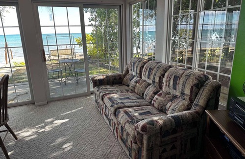 Tawas City Resort | Cozy 2-bedroom resort in Tawas City, MI on lake Huron with private deck/beach