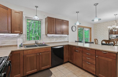 Mosinee Apartment | Cozy 2-Bedroom Retreat with Wooded Views, Fire Pit & Stylish Kitchen!