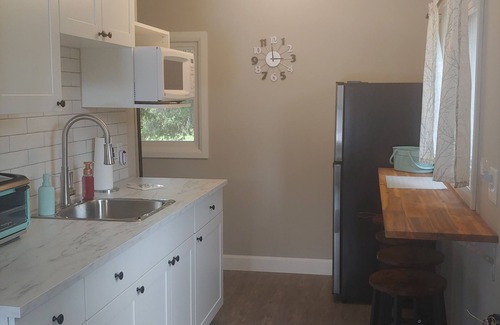 West Grey Resort | Cozy 2 bedroom river view suite with licensed restaurant on site