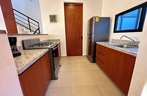 Chicxulub Puerto House | Cozy 2-bedroom townhome in enchanting Chicxulub with WiFi, private pool
