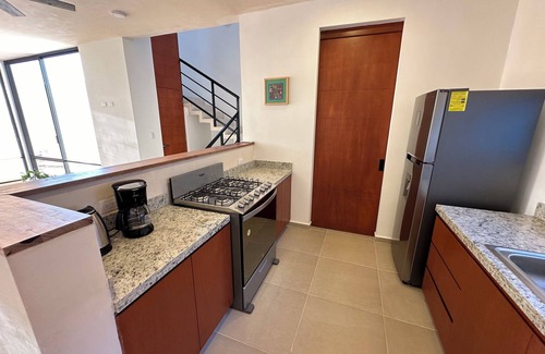 Chicxulub Puerto House | Cozy 2-bedroom townhome in enchanting Chicxulub with WiFi, private pool