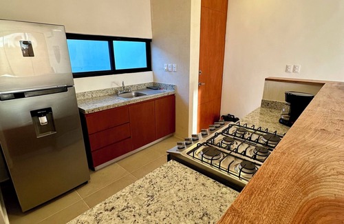 Chicxulub Puerto House | Cozy 2-bedroom townhome in enchanting Chicxulub with WiFi, private pool