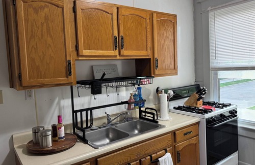 Plymouth Apartment | Cozy 2 Bedroom, with a Queen Bed in each, fire place, vanity, dresser, &two tv’s