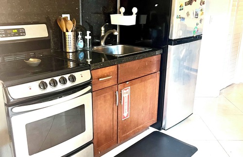South Middle River Apartment | Cozy 260 sq ft Studio with Nature Views, Desk, and Full Laundry
