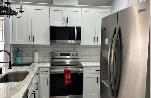 Arlington House | Cozy 2BR Getaway with Patio & Garage Near Shops, Dining & Highways!