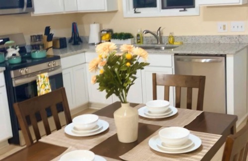 Greenville Condo | Cozy 2BR Retreat ,Gated Yard, Smart TVs & Coffee Bar!