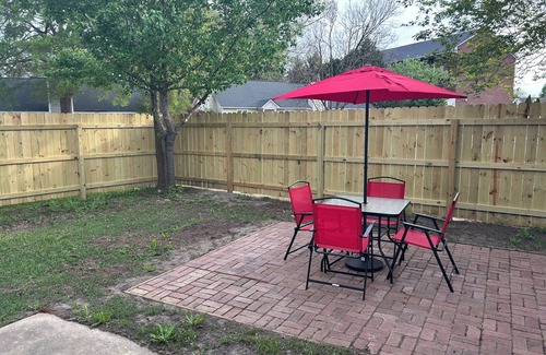Greenville Condo | Cozy 2BR Retreat ,Gated Yard, Smart TVs & Coffee Bar!