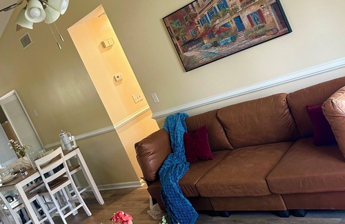 Greenville Condo | Cozy 2BR Retreat ,Gated Yard, Smart TVs & Coffee Bar!