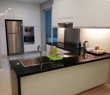 Bunga Paya Pantai Apartment | Cozy 3-bedroom Apartment with Swimming Pool