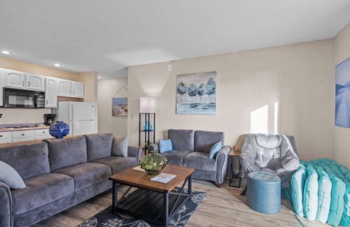 Kewadin Condo | Cozy 3-bedroom condo overing looking Torch Lake on the A-Ga-Ming Golf Course