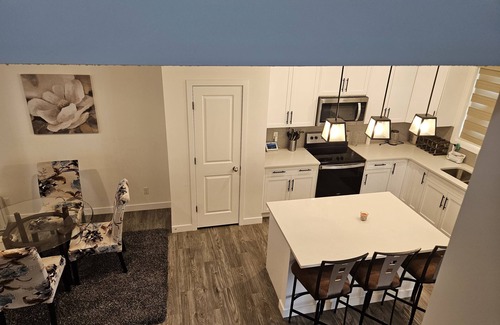 Airdrie House | Cozy 3 Bedroom Home Retreat with a Private Office.