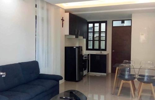 Cogon House | Cozy 3-bedroom condo with WiFi and fitness room in cool Tagbilaran City.